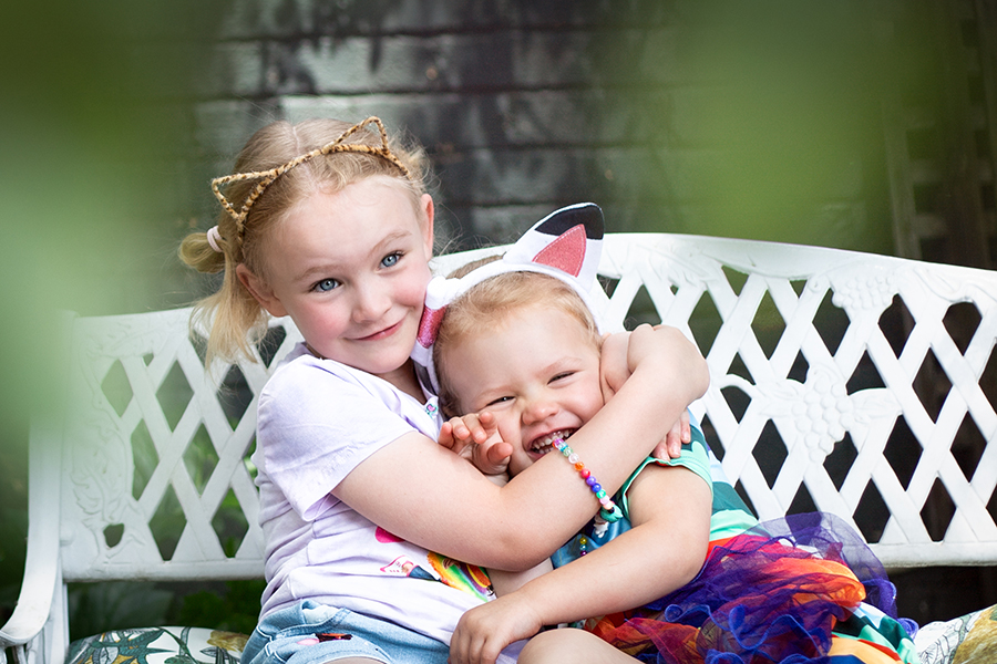 sisters  embracing